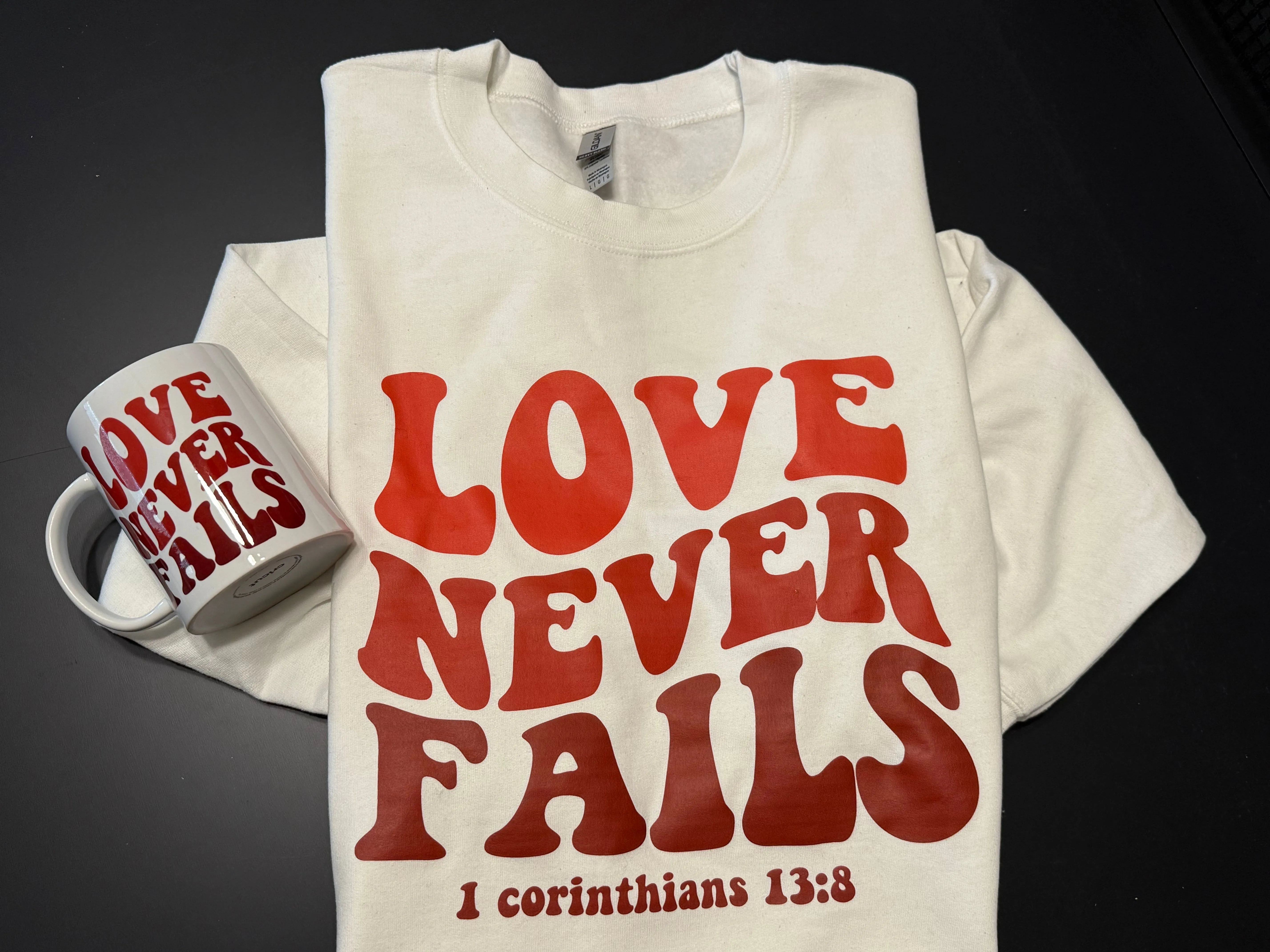 Love Never Fails Retro sweatshirt