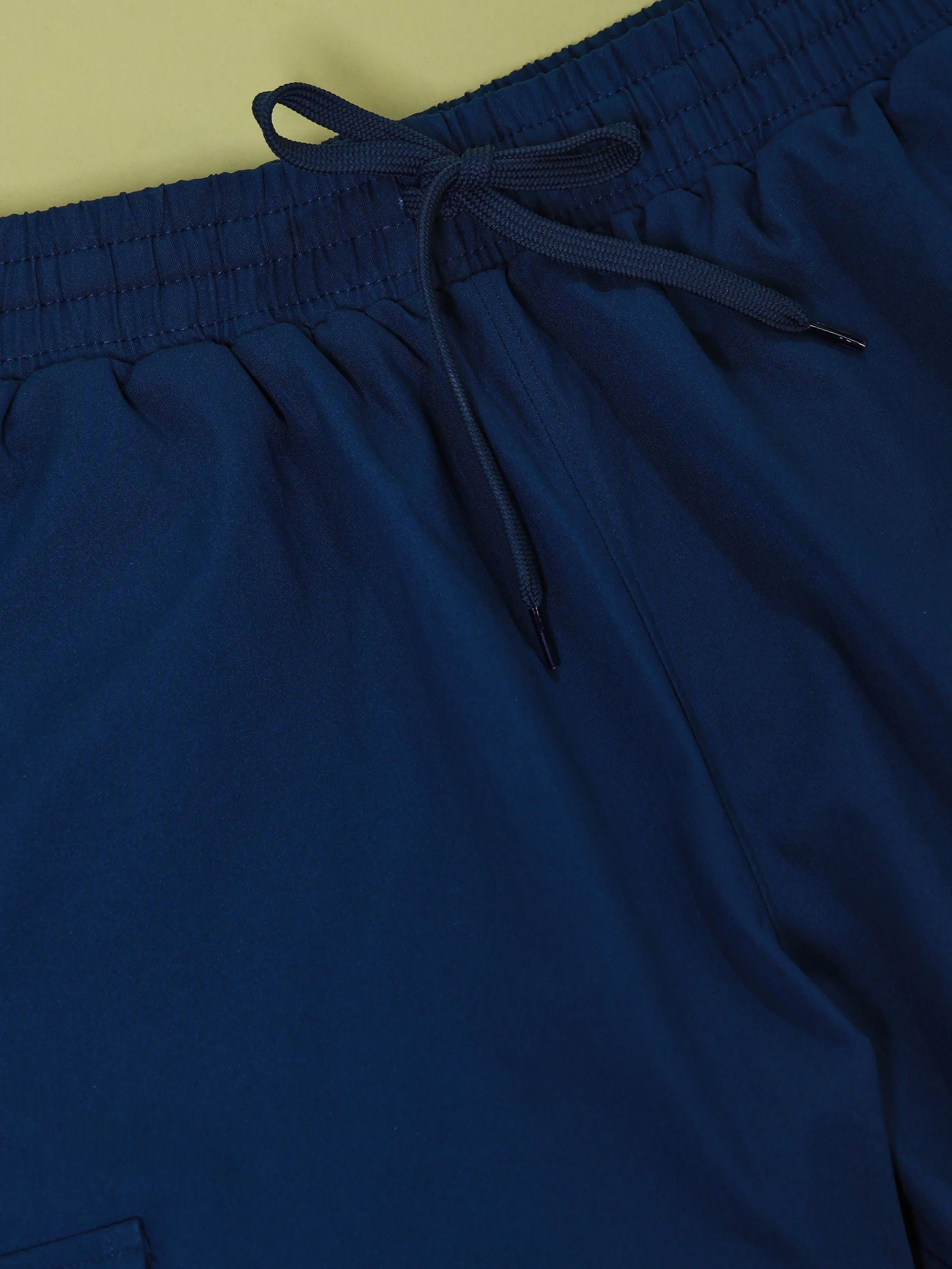 Men Solid Slim Fit Shorts with TS FLEXI