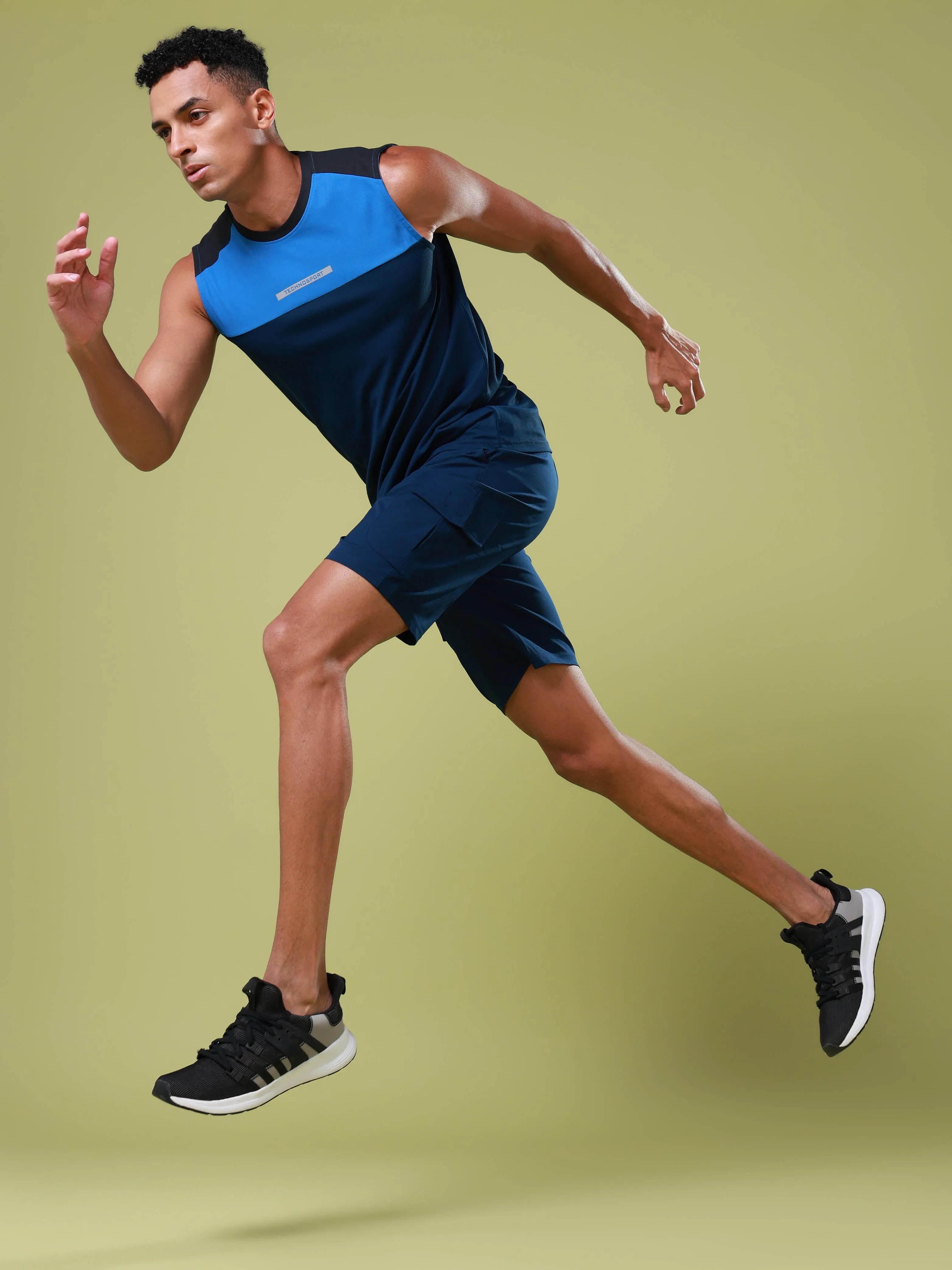 Men Solid Slim Fit Shorts with TS FLEXI